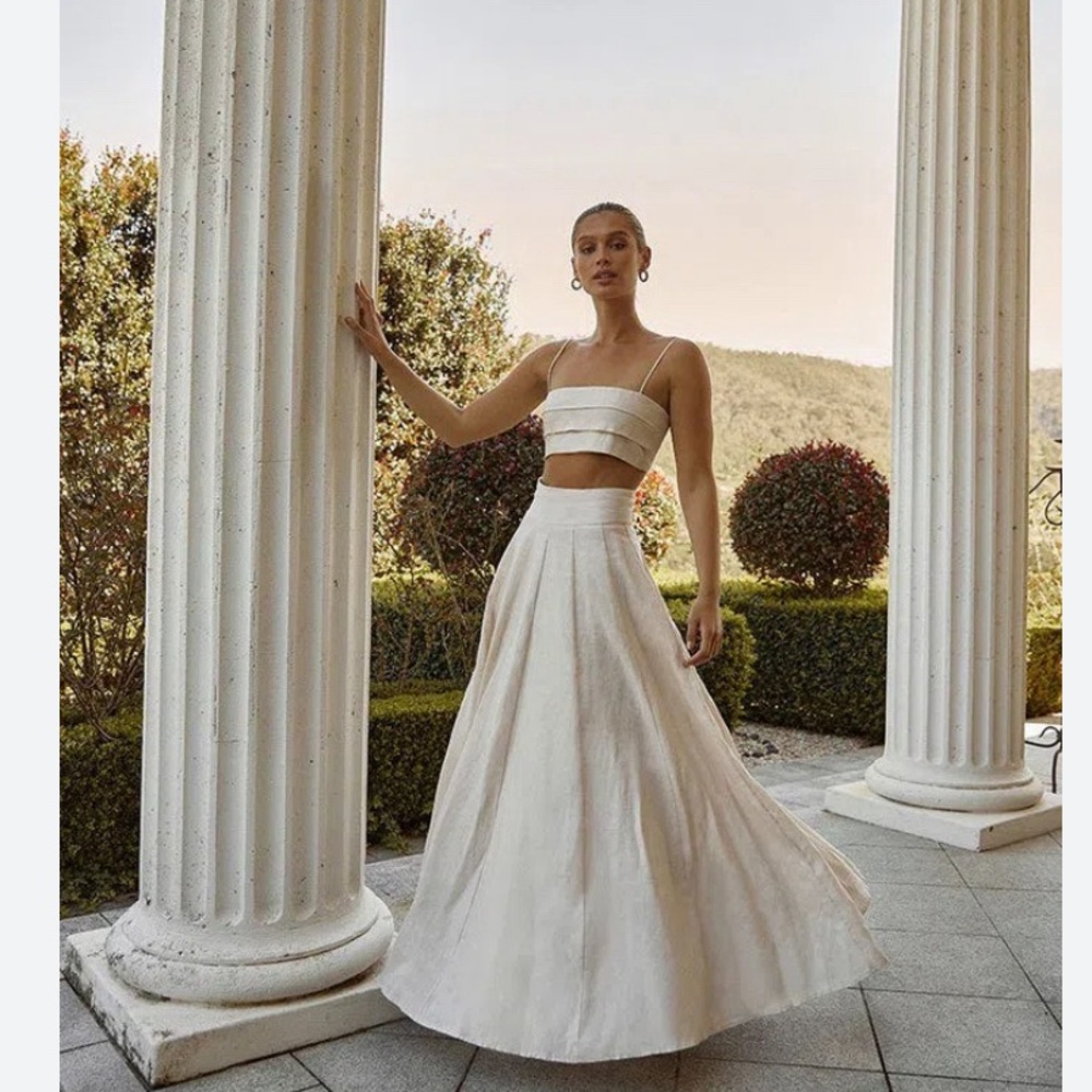 Dissh aisle white linen pleated crop top and skirt